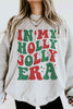 HOLLY JOLLY ERA CHRISTMAS GRAPHIC SWEATSHIRT